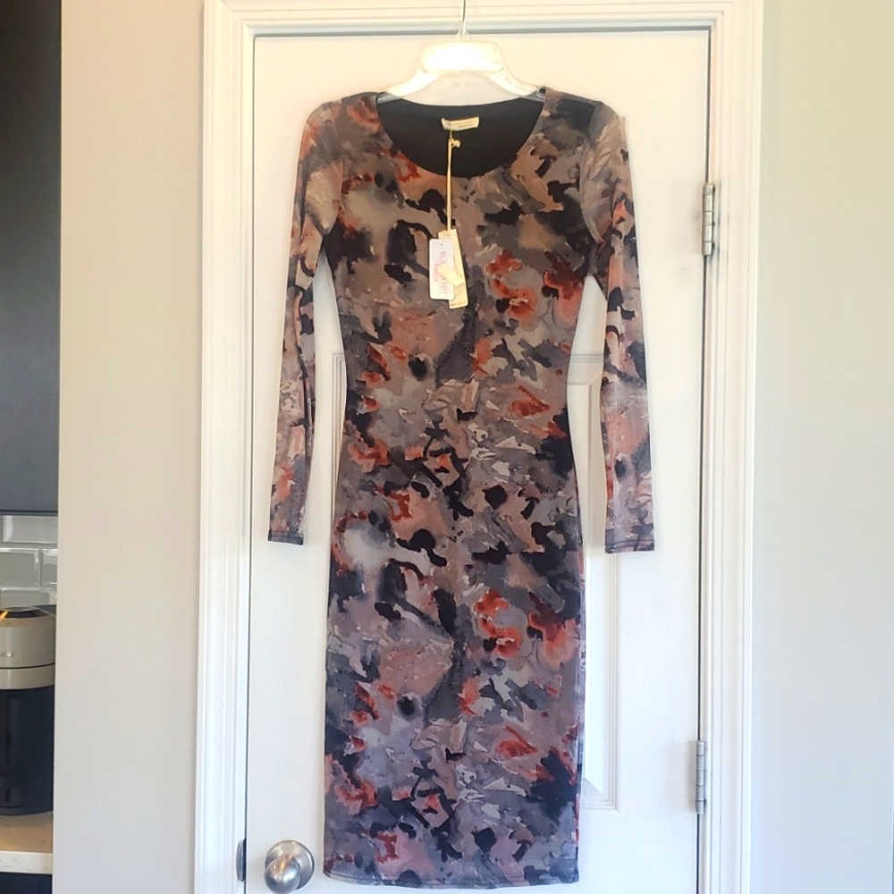 Lovestitch body con dress with sheer long sleeves. New with tag.